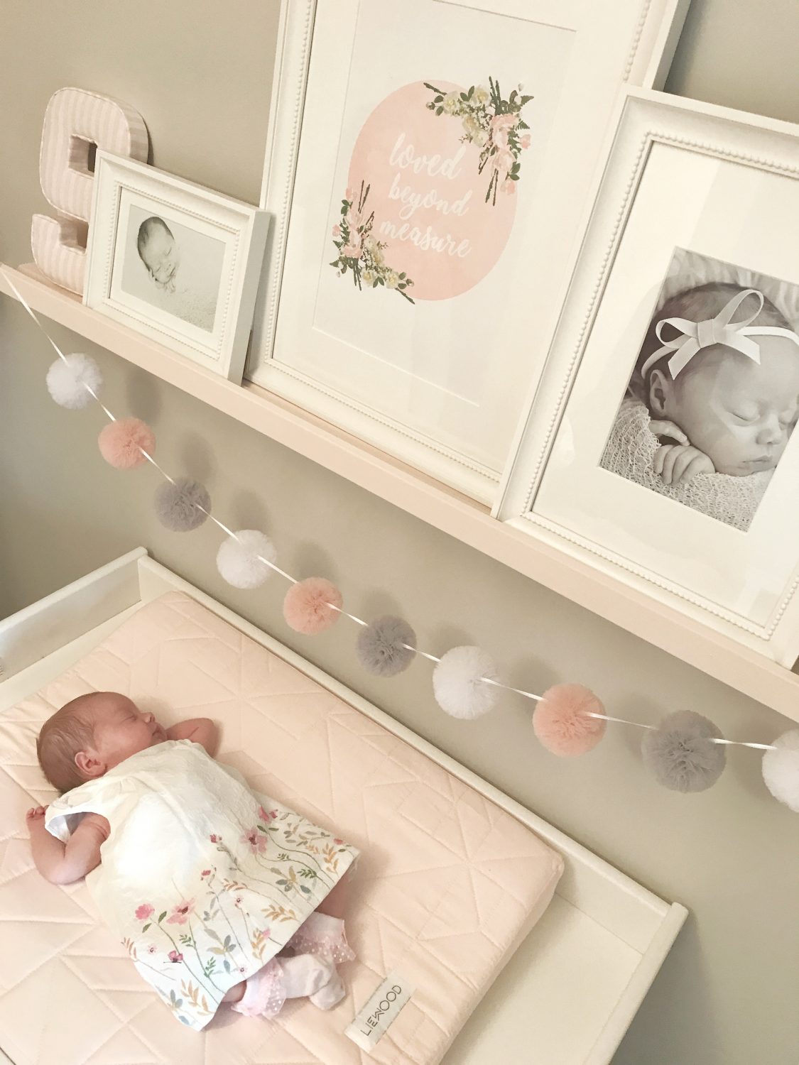 An oh-so-sweet nursery for a baby girl